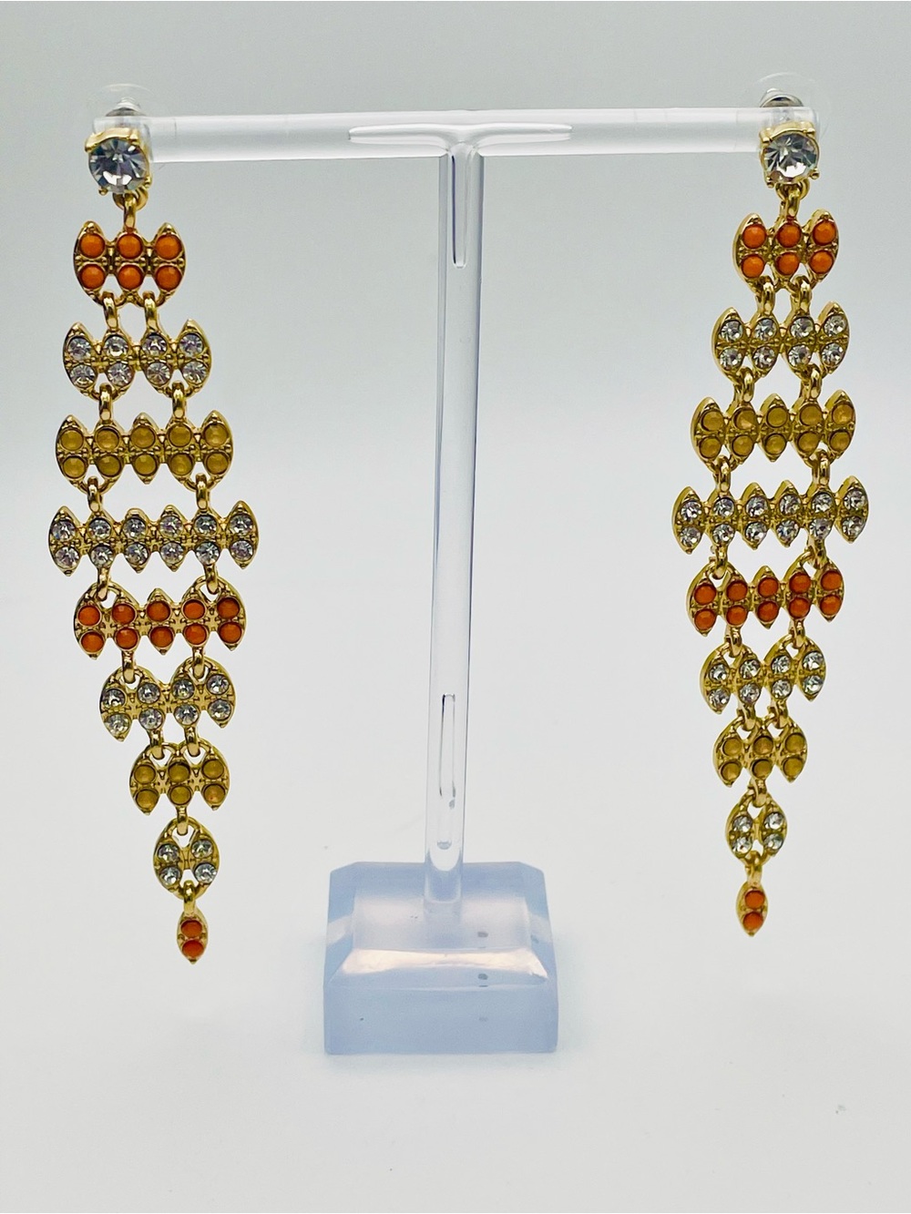 Long Gold-Tone Orange, Yellow, and Clear Crystal Chandelier Earrings.